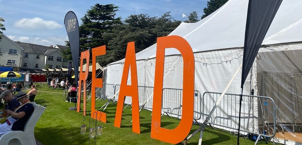 The word 'READ' spelled out in huge orange letters outside the large marquee at Harrogate known as 'The Tent'
