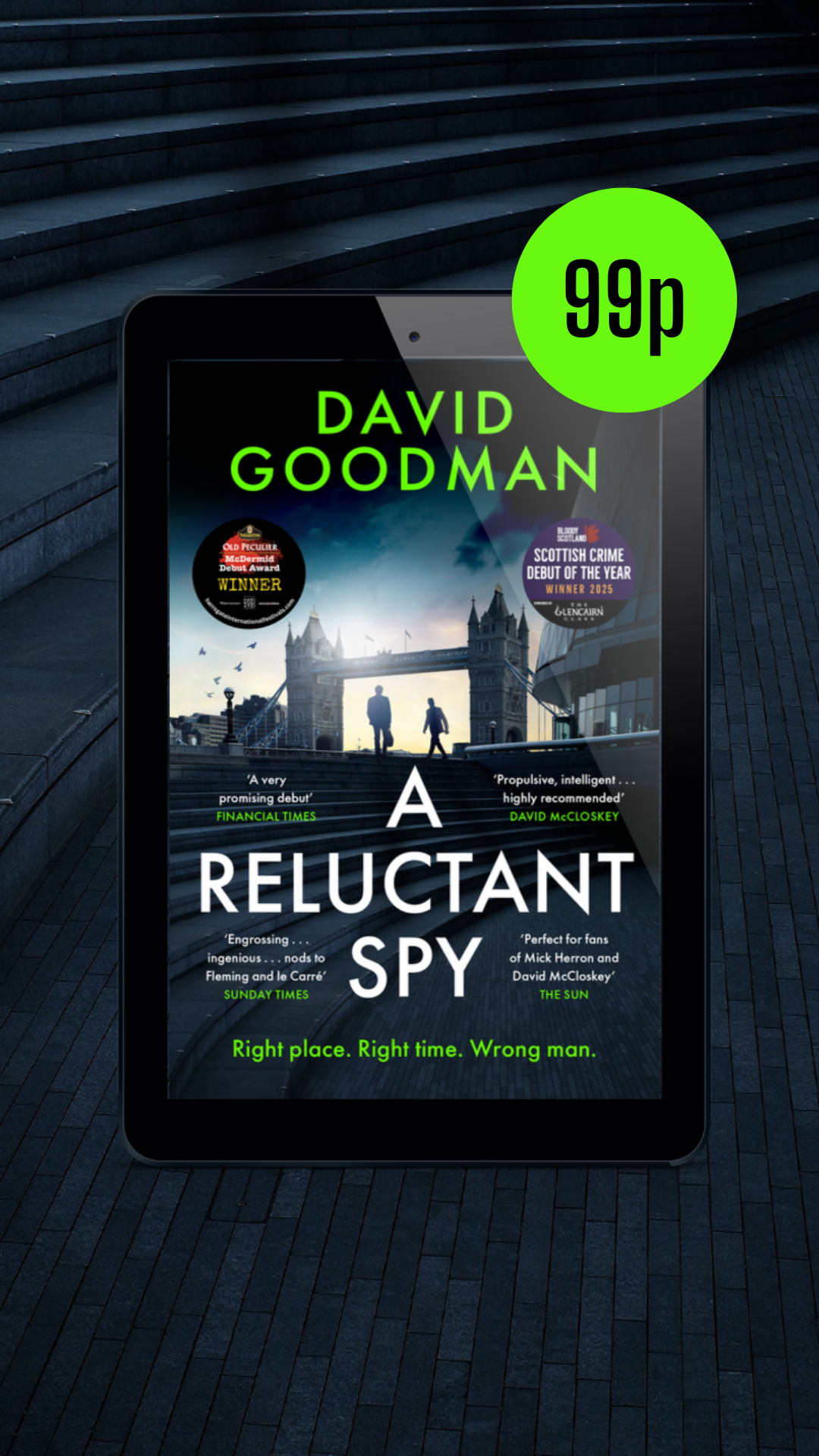 A promotional graphic for the eBook version of A Reluctant Spy, featuring the awards roundels for the McDermid Debut Award and Bloody Scotland Debut Prize, and a 99p sticker, on a dark background.